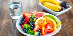 Colorful fruits and vegetables on a wooden table.